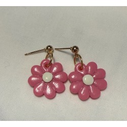 beautiful, small bright pink flower with gold details