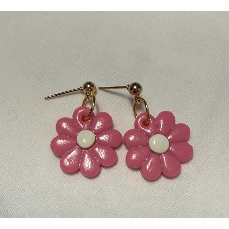 beautiful, small bright pink flower with gold details